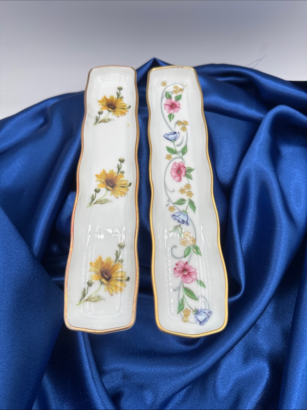 Vintage porcelain trays from Limoges, France, measuring  8.25” by 1.75”